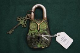 A novelty padlock in the form of an owl.