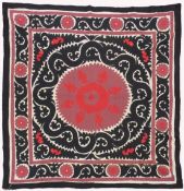 An Uzbek Suzani embroidered textile 158cm x 158cm.