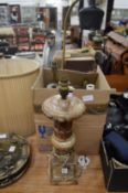 An alabaster table lamp and other lighting.