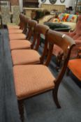 A set of six 19th century mahogany dining chairs with upholstered seats and turned front legs.