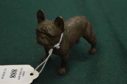 A small bronze model of a dog.
