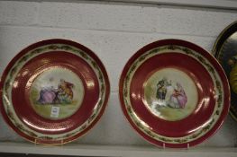 A pair of decorative porcelain dishes.