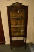 An Edwardian mahogany display cabinet.