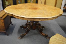 A Victorian burr walnut tilt-top breakfast table.