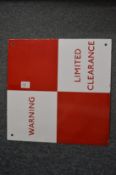 A red and white enamel sign, Warning Limited Clearance.