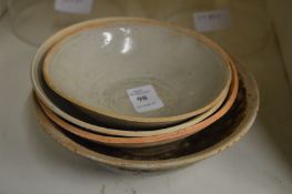 Four pottery bowls.