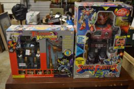 Two boxed and unused robots, a Super Fighter and a Thunder Warrior.