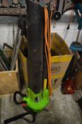 An electric garden leaf blower.