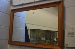 Two pine framed mirrors.