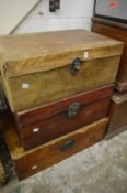 Three Chinese storage trunks.