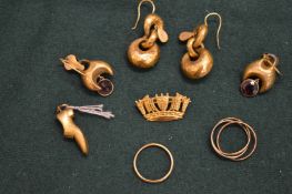 A 9ct gold brooch in the form of a crown and other items of jewellery.