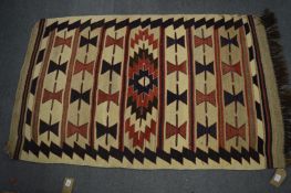 A flat weave Kilim rug 145cm x 88cm.