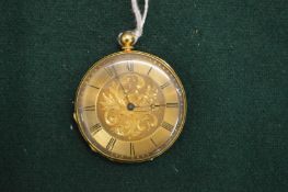 A small 18ct gold pocket watch with engraved decoration.