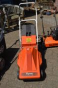 A Flymo electric rotary lawn mower.
