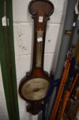 A 19th century rosewood barometer (part only).