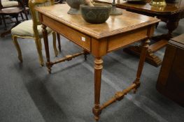 A Continental walnut side table.