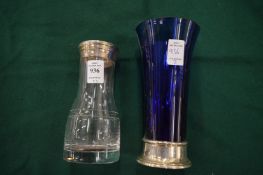 A glass and silver mounted sugar sifter together with a silver mounted blue glass trumpet shaped