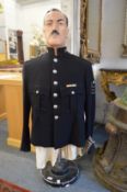A policeman's jacket circa 1950's on a realistic mannequin.