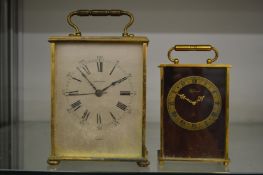A Garrard quartz carriage clock and another carriage clock.
