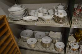 A comprehensive Limoge gilt decorated dinner service.