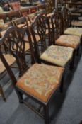 A set of four Georgian style mahogany dining chairs.