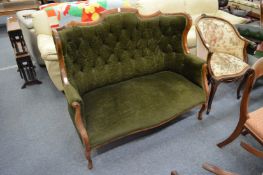 An Edwardian high back settee.
