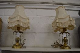 A good pair of ormolu and cut glass lustres converted to table lamps.