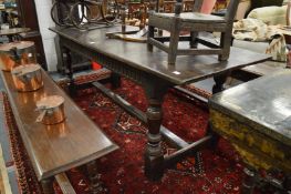 An oak refectory dining table 203cm long x 75cm wide.