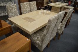 A stylish marble laminated rectangular twin pedestal dining table together with a set of six
