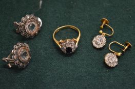 An 18ct gold, diamond and sapphire ring and two pairs of ear clips.