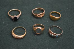 A collection of gold rings.