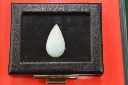 A large pear shaped opal with certificate.
