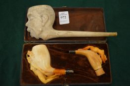 Clay and meerschaum pipes.