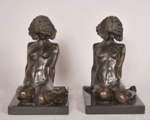 David Mackay-Harrison (b. 1941), Australian, a pair of book ends, of kneeling female nudes, each