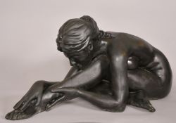 David Mackay-Harrison (b. 1941), Australian, a seated female nude stretching forward, bronze, signed