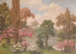 Early 20th Century Continental School, a lake view with trees and bushes in blossom, oil on
