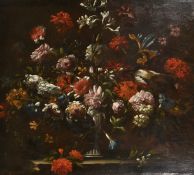 Manner of Jean-Baptiste Monnoyer, a still life of mixed flowers in an urn, oil on canvas, 29