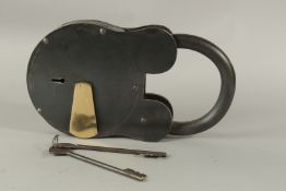 A LARGE METAL PADLOCK AND KEY. 37cms high.
