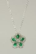 A FINE EMERALD AND DIAMOND 18ct WHITE GOLD PENDANT AND CHAIN.