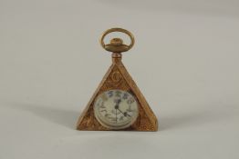 A BRASS TRIANGULAR MASONIC WATCH.