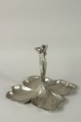 AN ART DECO PEWTER MAIDEN ON A QUADRUPLE SHAPED BASE. 26cms high.