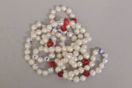 A LONG STRING OF ONE HUNDRED AND TWENTY PEARLS. 120cms long.