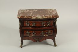 A LOUIS XVTH STYLE APPRENTICE COMMODE with marble top, two long drawers with ornate handles, on