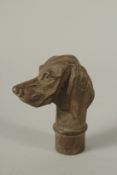 A BRONZE WALKING STICK HANDLE 'HOUND'.