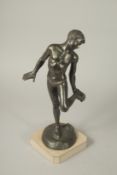 P. UCCELLO, NAPOLI. A SPELTER FIGURE OF A YOUNG BOY stood on a crab.. Signed, on a marble base.