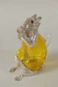 AN AMBER GLASS AND SILVER PLATED SQUIRREL CLARET JUG. 18cms high.