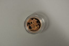 2010. A FULL GOLD PROOF SOVEREIGN in capsule FDC with box and COA.
