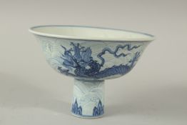 A CHINESE BLUE AND WHITE PORCELAIN DRAGON STEM CUP. 17cms diameter.