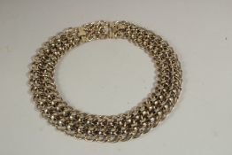 A HEAVY MONET GILT CHAIN.
