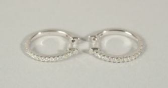 A PAIR OF DIAMOND HOOP EARRINGS, diamond 0.50 approx, 18ct hallmarked white gold.